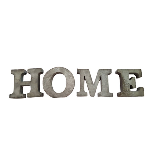 Buchstaben "HOME" aus Zink